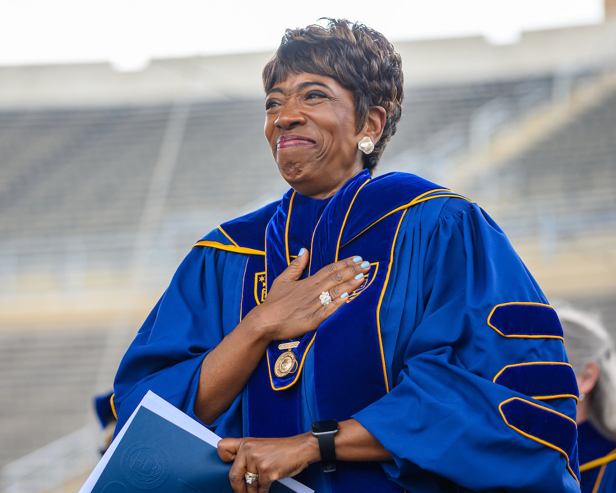 A jubilant Carla Harris acknowledges the crowd after her address at Notre Dame Stadium where she was conferred the prestigious Laetare Medal May 23 during the university’s commencement ceremony. She is a longtime member of St. Charles Borromeo parish in Harlem.